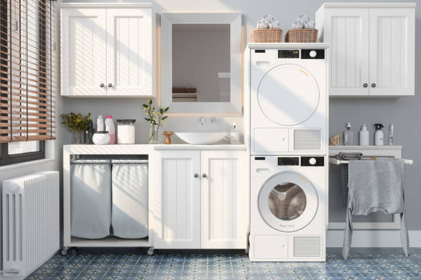 A bright white laundry room featuring a washer and dryer set against a clean, minimalist backdrop.